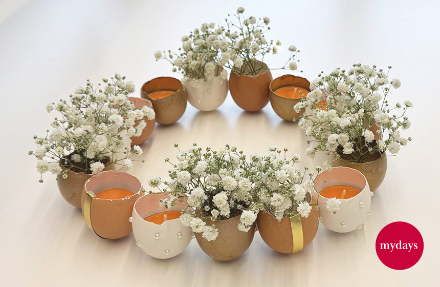 Der DIY Osterkranz dekoriert mit Schleierkraut und Teelichtern - deine Tischdeko für Ostern ist ein echter Hingucker!